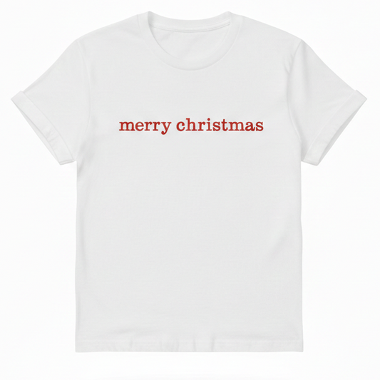 A white T-Shirt with the words "Merry Christmas" embroidered on the front in red thread